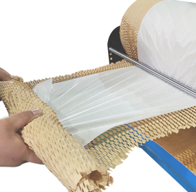 벌집종이완충재+수동기계